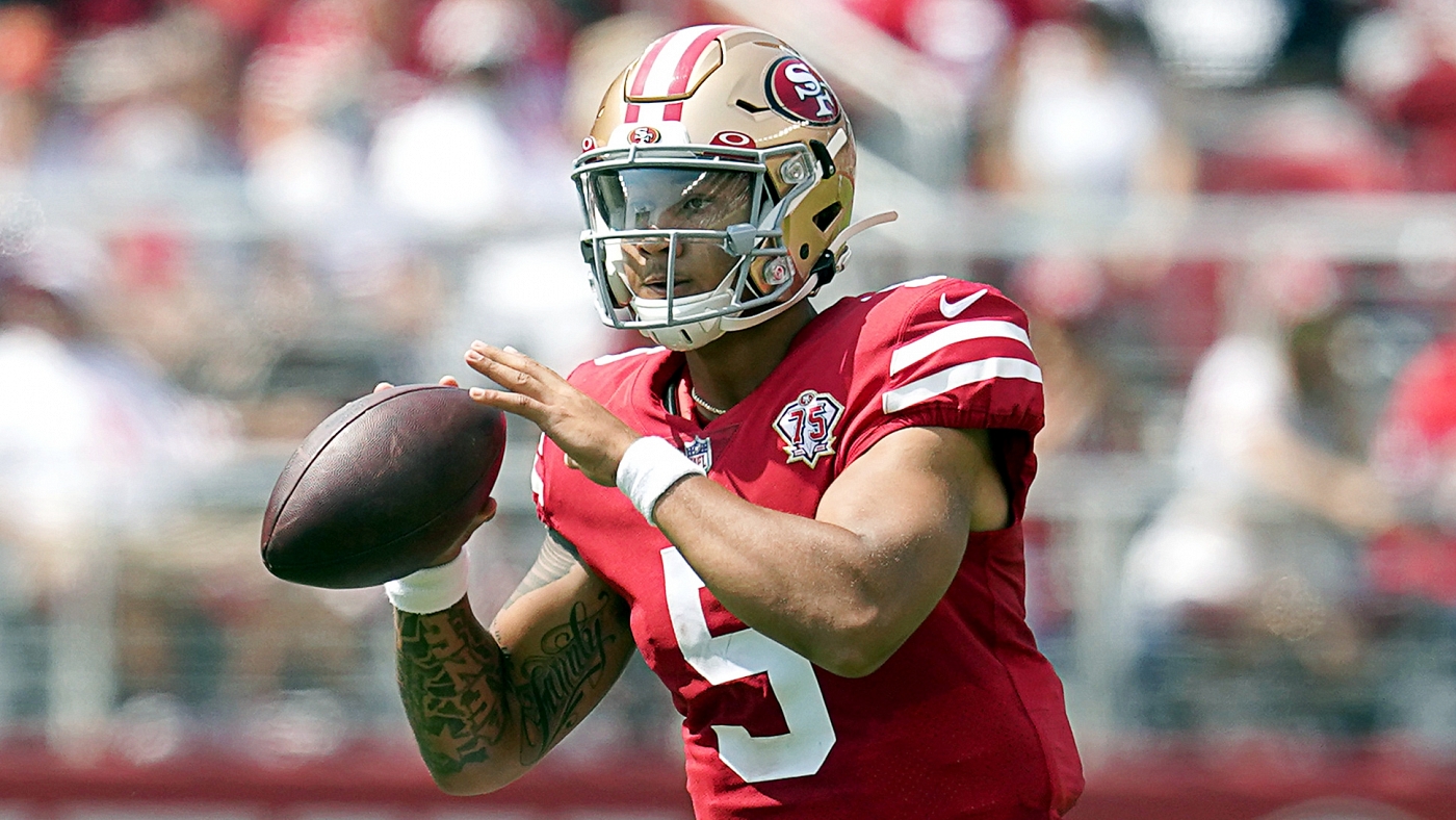 Injured San Francisco 49ers quarterback Trey Lance, facing hugs