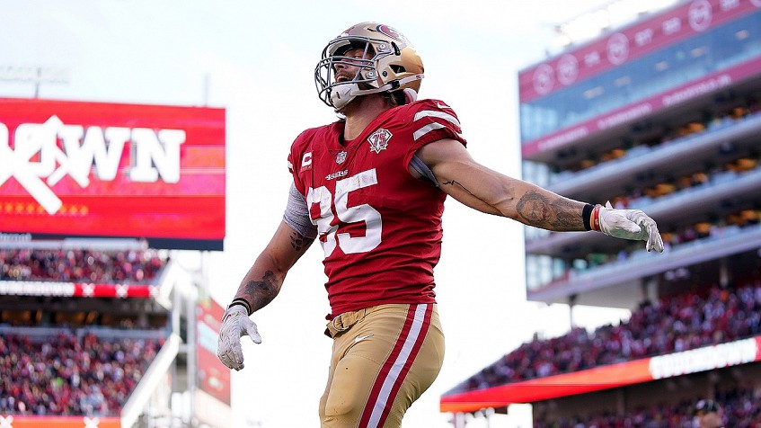 DENVER, CO - SEPTEMBER 25: San Francisco 49ers tight end George Kittle (85)  is hit after a catch by Denver Broncos safety Kareem Jackson (22) during a  game between the San Francisco