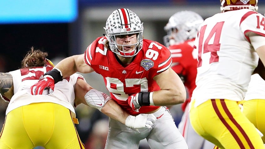 Ohio State defensive end Nick Bosa poses with his new team jersey after the  San Francisco 49ers selected Bosa in the first round at the NFL football  draft, Thursday, April 25, 2019