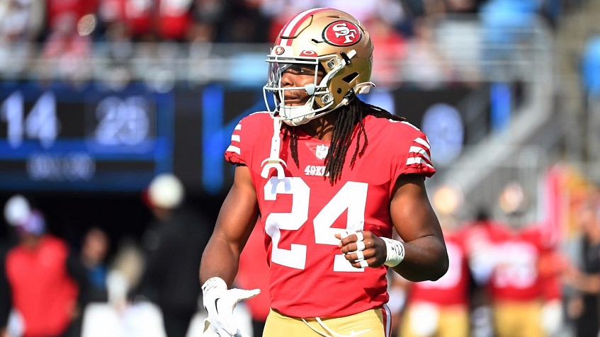 SANTA CLARA, CA - DECEMBER 04: San Francisco 49ers running back Jordan Mason  (24) runs through the