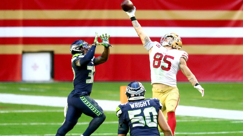 San Francisco 49ers tight end George Kittle (85) spikes the ball after  scoring a touchdown along side wide receiver Jauan Jennings (15) during an  NFL football game against the Cincinnati Bengals, Sunday