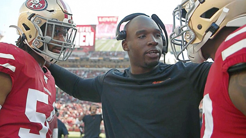 San Francisco 49ers defensive coordinator DeMeco Ryans looks up at a replay  during an NFL football game against the Minnesota Vikings, Sunday, Nov. 28,  2021, in Santa Clara, Calif. (AP Photo/Scot Tucker