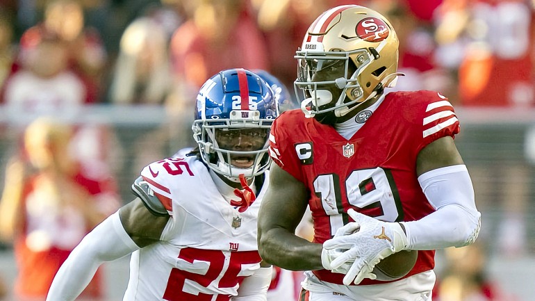 San Francisco 49ers safety George Odum (30) runs after an interception  during an NFL football game against the Arizona Cardinals, Sunday, Jan.8,  2023, in Santa Clara, Calif. (AP Photo/Scot Tucker Stock Photo 