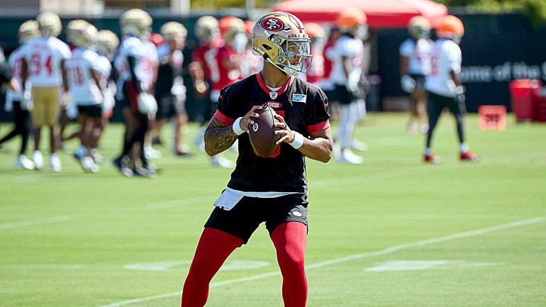 Quarterback Trey Lance of the San Francisco 49ers escapes a sack News  Photo - Getty Images