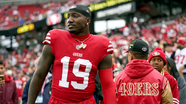 HOUSTON, TX - AUGUST 25: San Francisco 49ers wide receiver Deebo Samuel  (19) chats with  TNF commentator and former NFL cornerback Richard  Sherman during the NFL game between the San Francisco