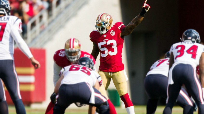 San Francisco 49ers linebacker Patrick Willis (52) gives a high five to  linebacker NaVorro Bowman (53) after stopping the New England Patriots in  the fourth quarter at Gillette Stadium in Foxborough, Massachusetts