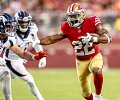 Santa Clara, United States. 27th Sep, 2021. San Francisco 49ers runningback  Trenton Cannon (49) fends off Green Bay Packers cornerback Shemar  Jean-Charles (22) at Levi's Stadium in Santa Clara, California on Sunday