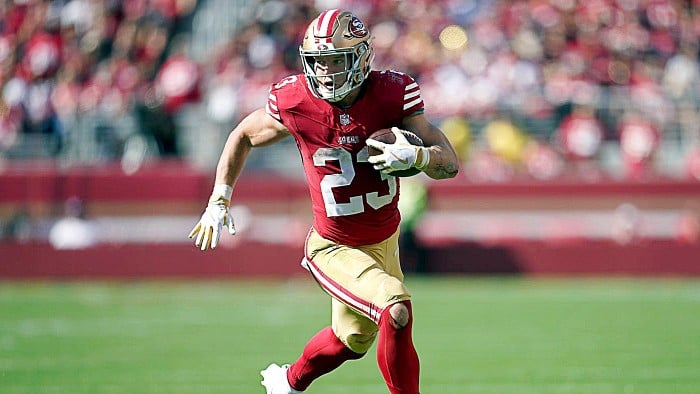 Christian McCaffrey and the 49ers win 13th straight in the regular