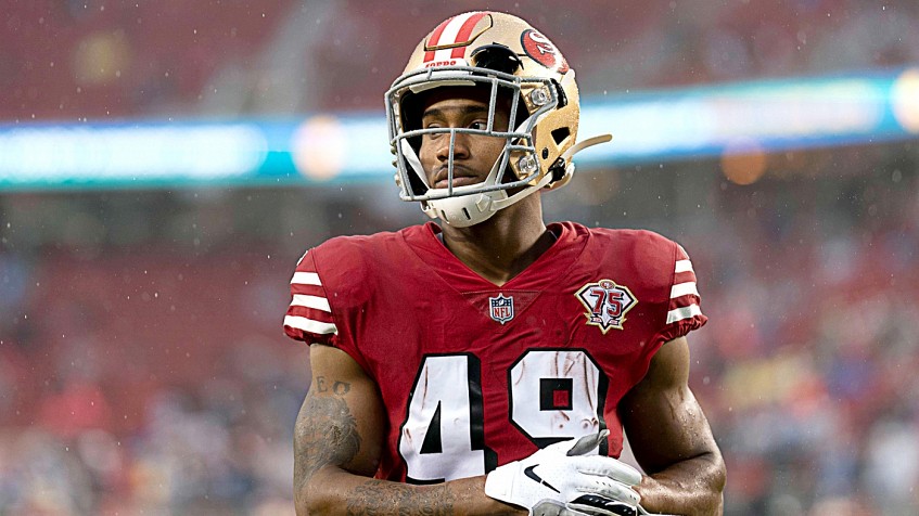 San Francisco 49ers defensive back Emmanuel Moseley, left, breaks up a pass  intended for Seattle Seahawks wide receiver D.K. Metcalf during overtime of  an NFL football game in Santa Clara, Calif., Monday