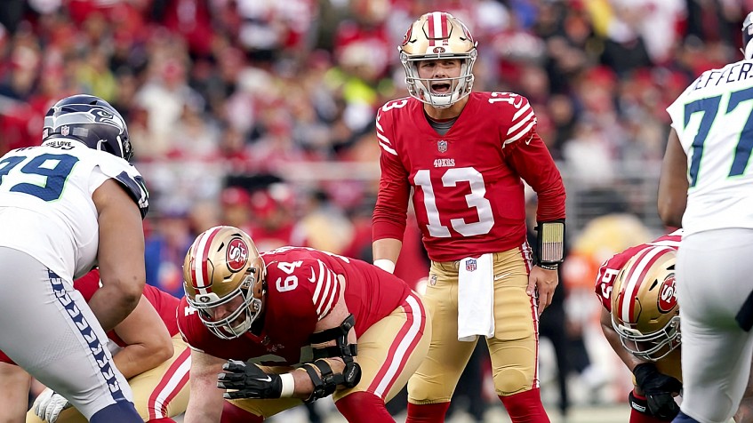 San Francisco 49ers linebacker Dee Winters (53) signals during an