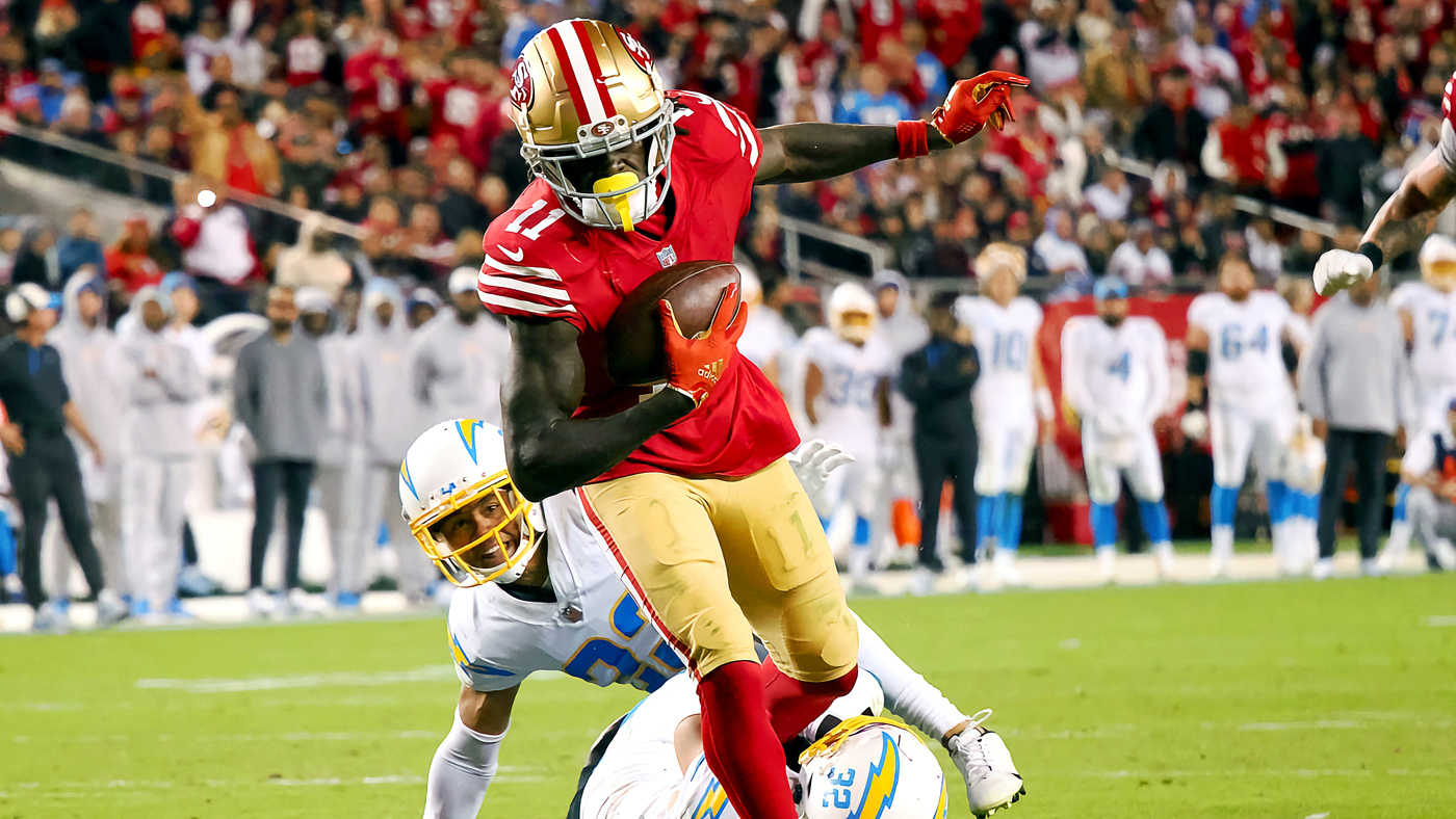 Brandon Aiyuk of the San Francisco 49ers runs after making a catch