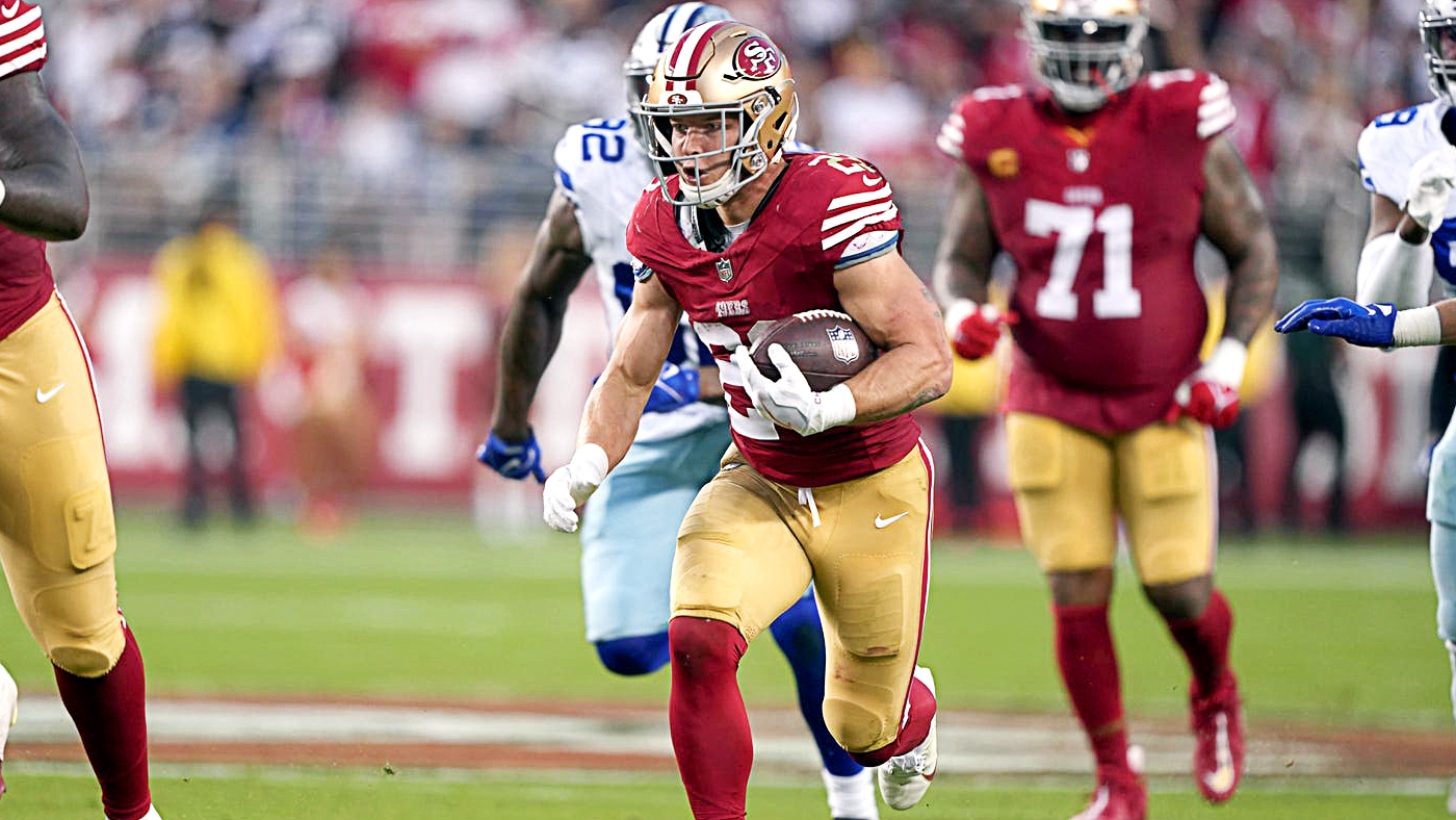 San Francisco 49ers running back Christian McCaffrey (23) walks on