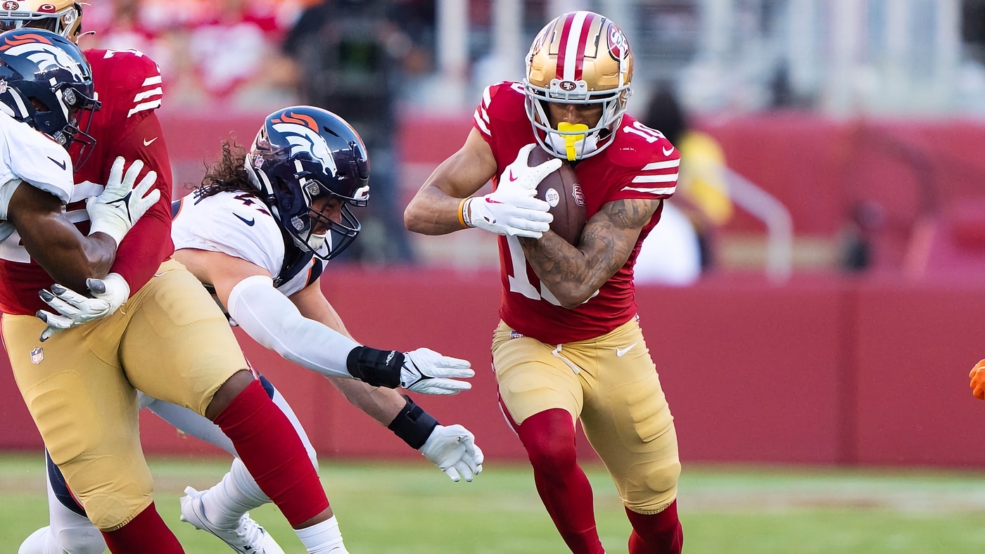 San Francisco 49ers fan breaks up a fight between two NFL players in wild  in-game moment caught on camera