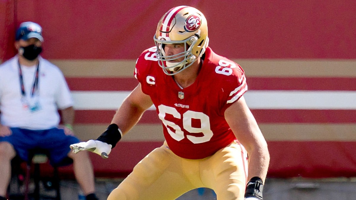 San Francisco 49ers Mike McGlinchey (69) walks on the field with a shirt  displaying Crucial Catch during an NFL football game against the Seattle  Seahawks, Sunday, October 3, 2021, in Santa Clara