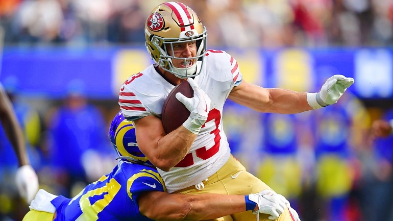 Christian McCaffrey of the San Francisco 49ers rushes the ball in