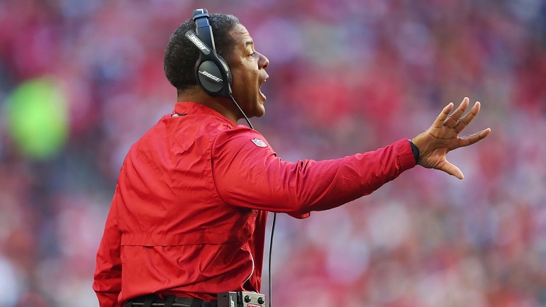 Carolina Panthers head coach Steve Wilks walks off the field after