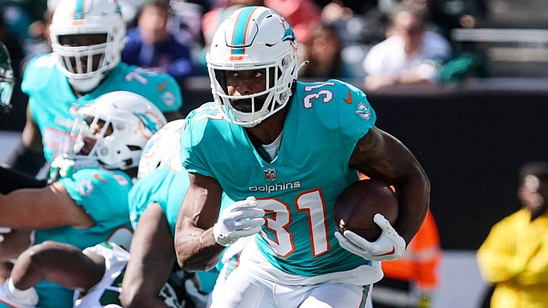 Dolphins visit 49ers in matchup of division leaders