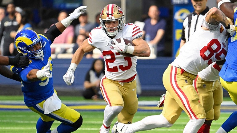 San Francisco 49ers running back Christian McCaffrey (23) and wide receiver Deebo  Samuel (19) celebrate a TD during an NFL football game against the Tampa  Bay Buccaneers, Sunday, Dec.11, 2022, in Santa