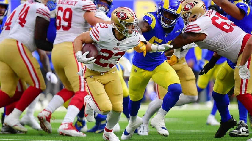 San Francisco 49ers wide receiver Brandon Aiyuk (11) catches a pass over  Arizona Cardinals cornerback Christian